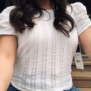 🌬free people brand white top with open back 🌬